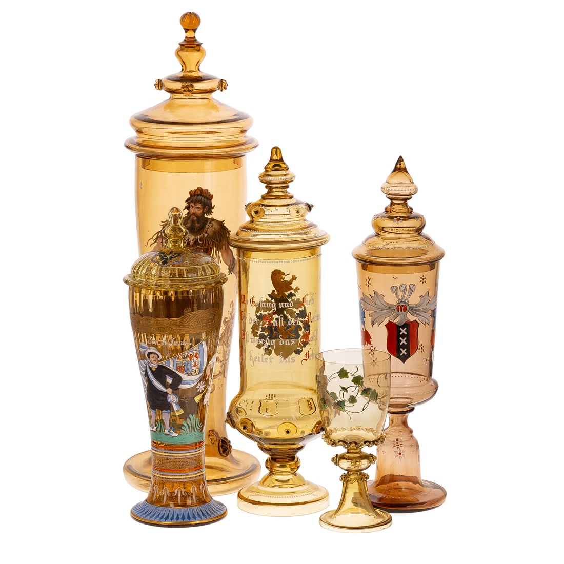 Two Covered Beakers, Roemer & Steeple Cup Pair: (Continental, probably German/Bohemian, late 19th/early 20th century) Blown amber glass with armorial/fairy tale enamel painting, size of tallest: 23 1/2 in. H