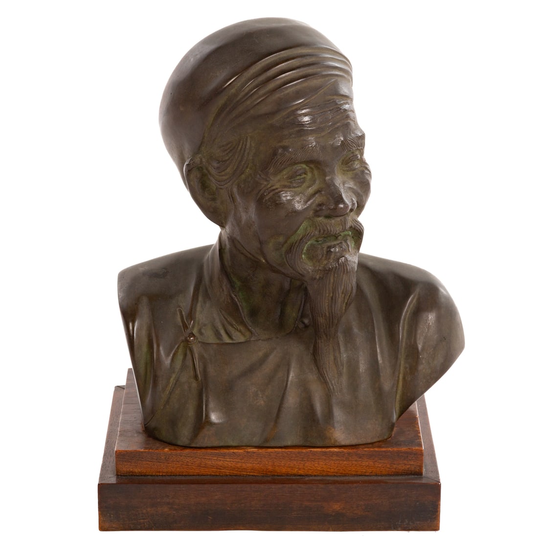 Southeast Asian Bust of Ho Chi Minh: (Vietnamese, 1890-1969) Cast bronze with green-brown patina, base of back stamped "Made in French Indo China," 16 x 12 x 7 in.