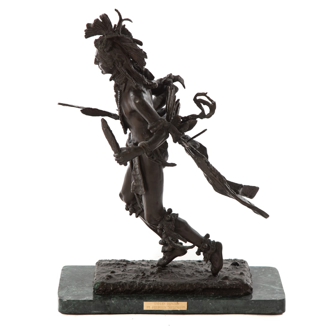 After Remington. "Indian Dancer," bronze: (American, 1861-1909) After Frederick Remington's "Indian Dancer," patinated bronze on variegated green marble base, 23 in. H, 13 in. W