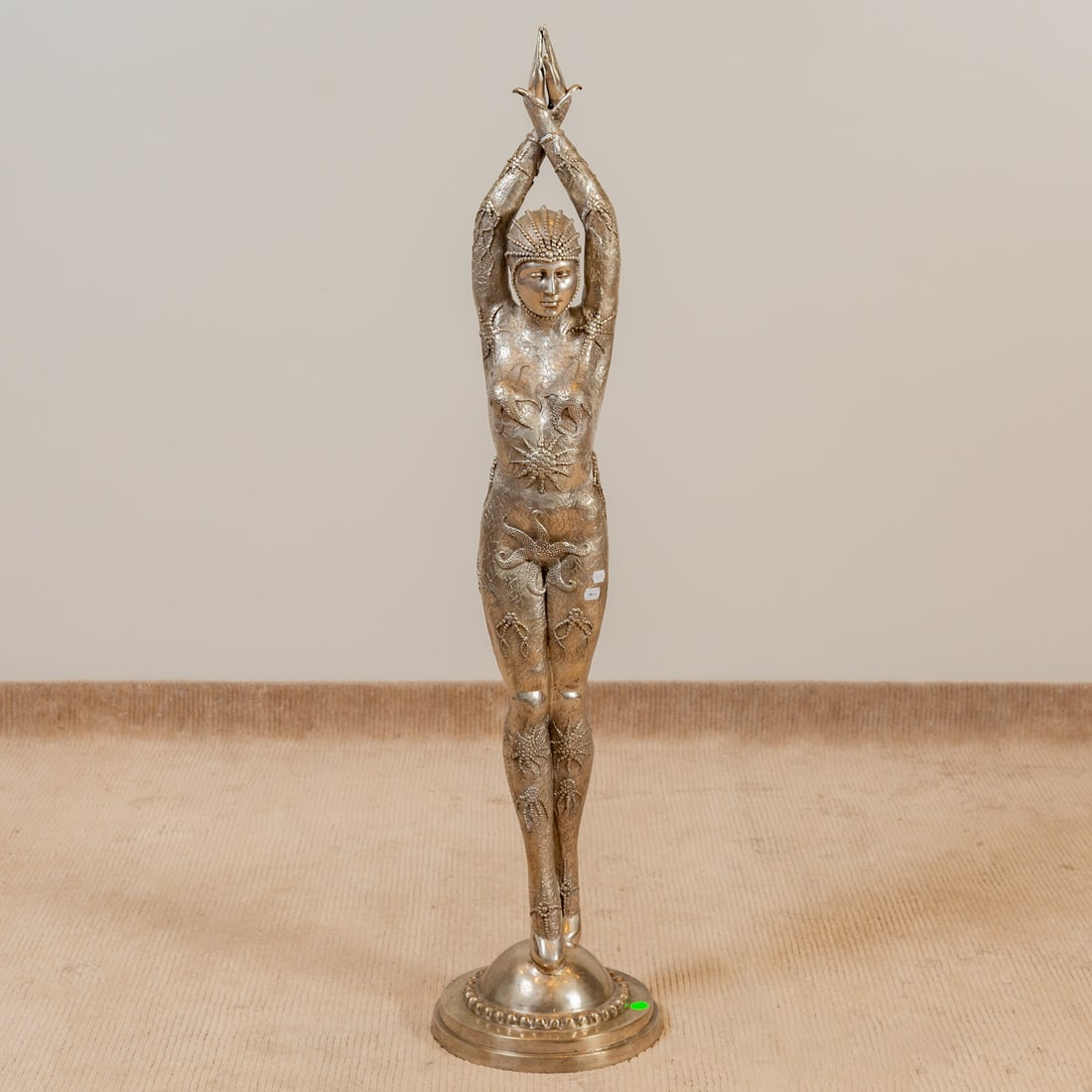 Art Deco Style Silvered Metal Figure of Dancer: In period costume on a circular base, 55 in. H, 13 in. Diam.