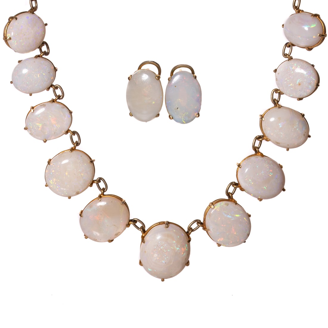 An Opal Line Necklace & Earrings in 14K & 10K: 1) 10K yellow gold flat double link necklace featuring a graduated line of oval opal cabochons prong set in 14K yellow gold setting, box clasp with safety latch, 15 1/2 in. L, and 2) Vermeil earrings