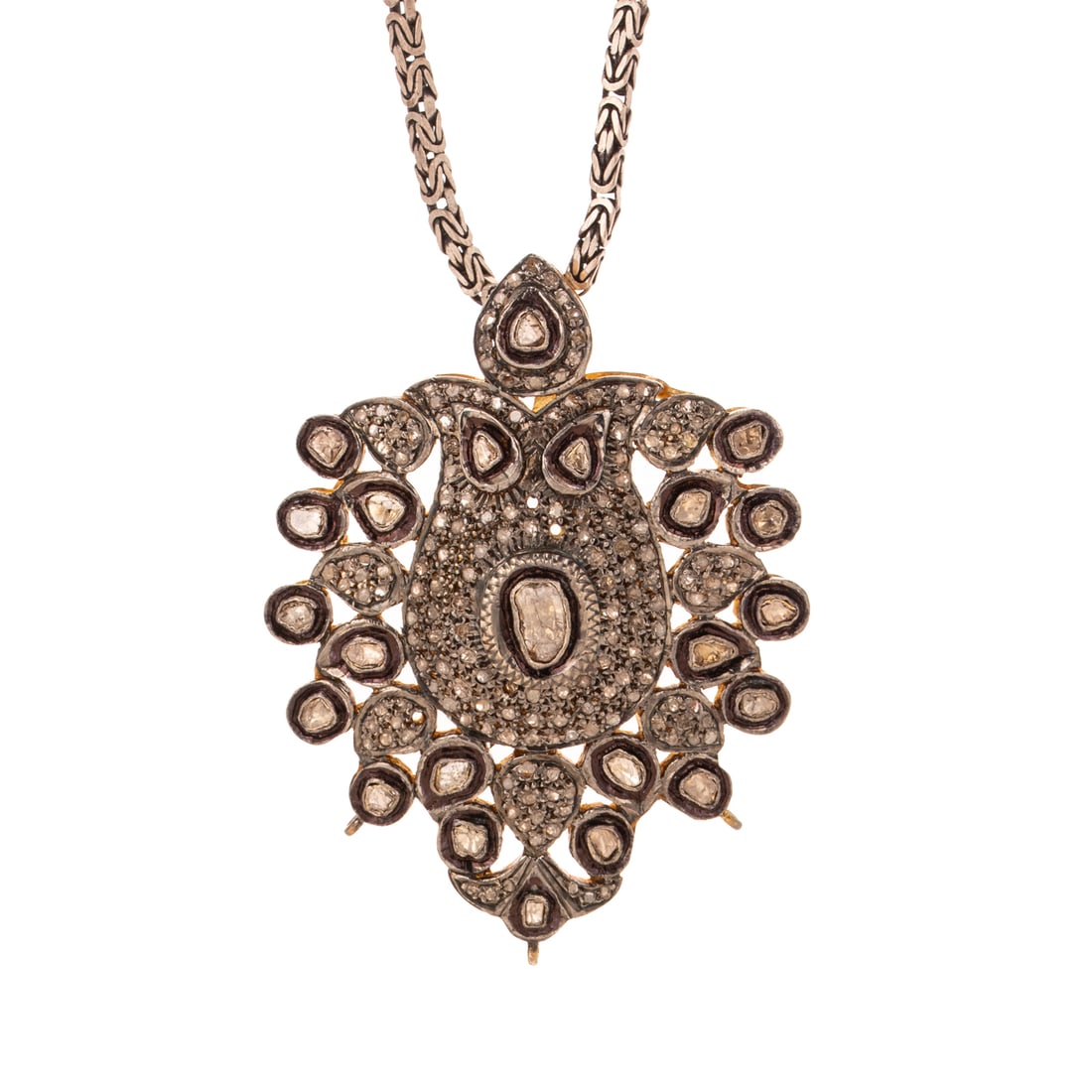 An Antique Native Cut Diamond Pendant & Chain: Sterling silver pendant featuring various shape native cut diamonds pave set and bezel set throughout freeform pendant, approx. 4.00 ctw, back gold plated over sterling silver, 1 7/8 in. L, hanging on