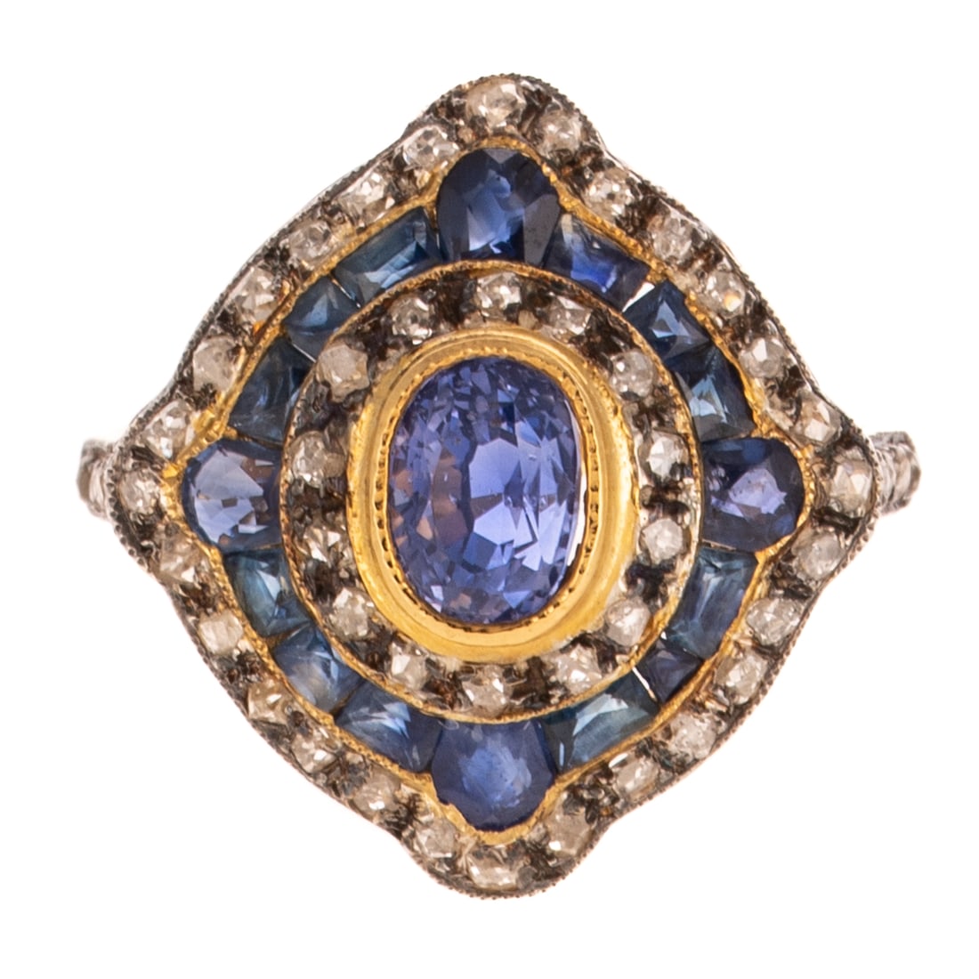 A Color Changing Sapphire & Diamond Ring: 18K yellow gold and vermeil ring featuring an oval mixed cut color changing Ceylon sapphire approx. 0.80 ctw bezel set with rose and native cut diamond halo and two concentric lozenge shape halos of F