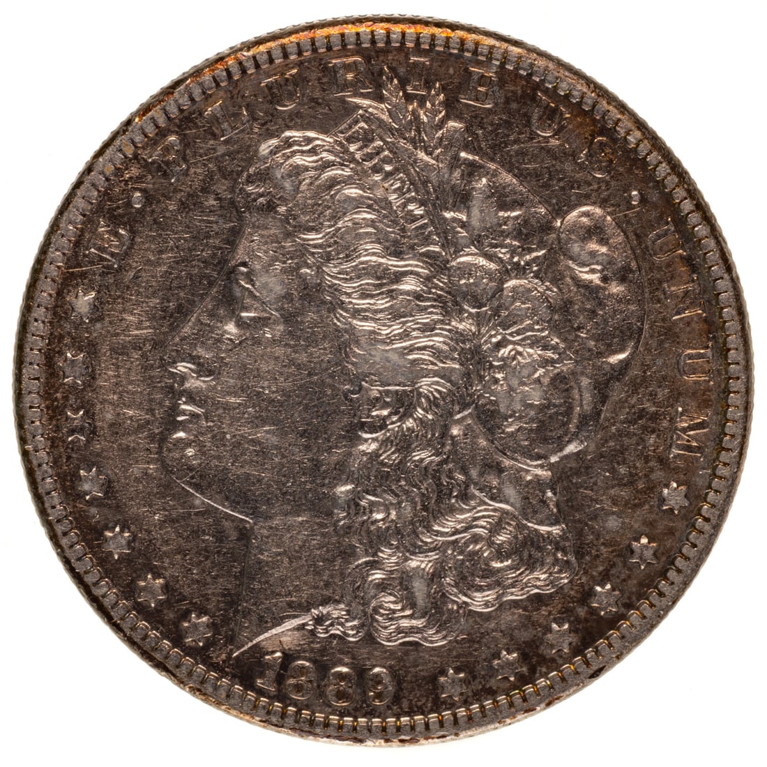1889-CC Morgan XF Details: Nice AU strike with cleaning and small rim ding at 6:30 obverse. Some areas of reflective surfaces which were common on 89-CC dollars but increased the eye appeal. The most valuable of the Carson