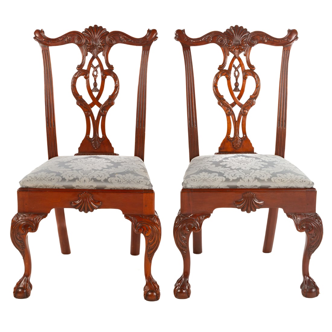 A Pair of Hickory Chair Mount Vernon Side Chairs: 20th century, heavily carved crest rails and backsplats, stop fluted styles, shell carved aprons holding upholstered drop seats, carved knees, cabriole legs ending in ball and claw feet, 40 1/2 in. H,