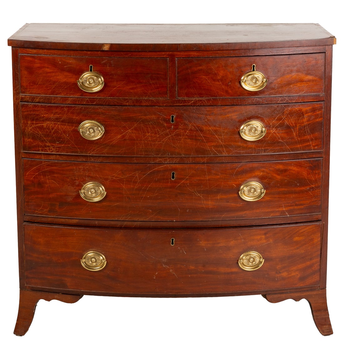 Federal Mahogany Bowfront Chest: Banded inlay top above two over three drawer construction, ending in French feet, 36 3/4 in. H, 38 3/4 in. W, 22 1/4 in. D Provenance: From the Estate of James Plumer, Baltimore, MD. Jim was a