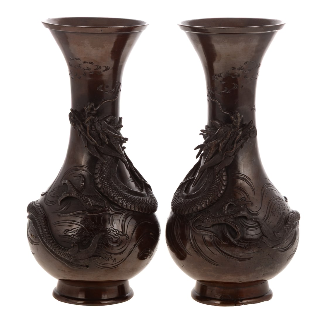 A Pair of Japanese Bronze Dragon Vases: A pair of bronze Japanese Meiji style dragon high relief vases with a tapering neck and a flared rim, 9 3/4 in. H, 5 in. Diam.