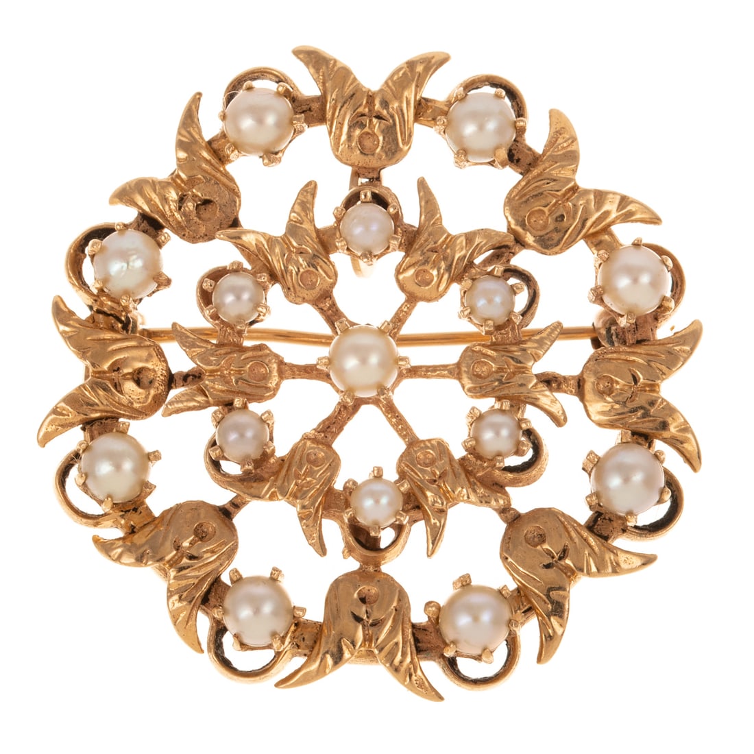 A Floral Pearl Cluster Pin/Pendant in 14K: 14K yellow gold pin/pendant featuring engraved floral designs amongst two layers of cultured pearls, pearls measuring 2.5 - 4 mm, hinged collapsible bail, 1 3/8 in. W, 10.1 grams Provenance: From the 