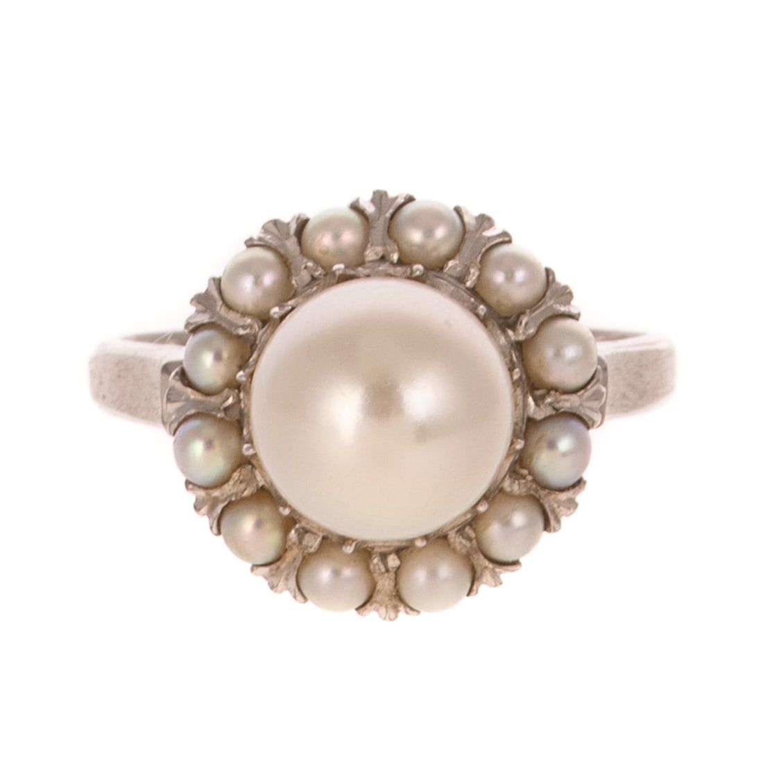 A Pearl Cocktail Ring in 14K: 14K white gold cocktail ring featuring a cultured pearl measuring 8 mm, with good lustre, pearl halo, sz 5.75, 3.9 grams