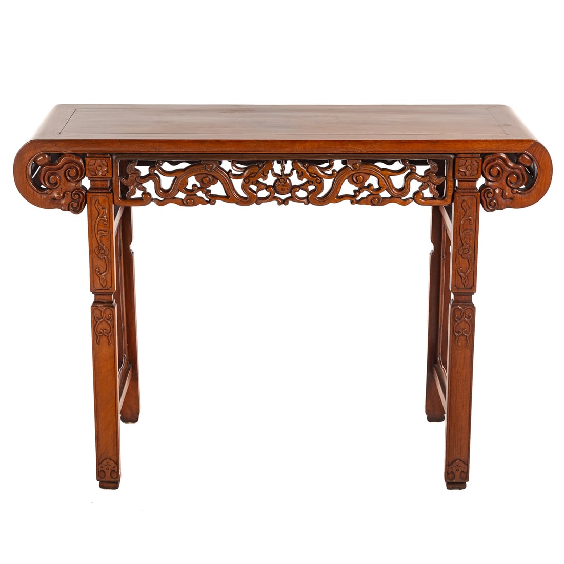 Chinese Carved Hardwood Altar Table: Pieced and incised top over reticulated apron on carved trestle form base, 33 in. H, 46 in. W, 16 in. D