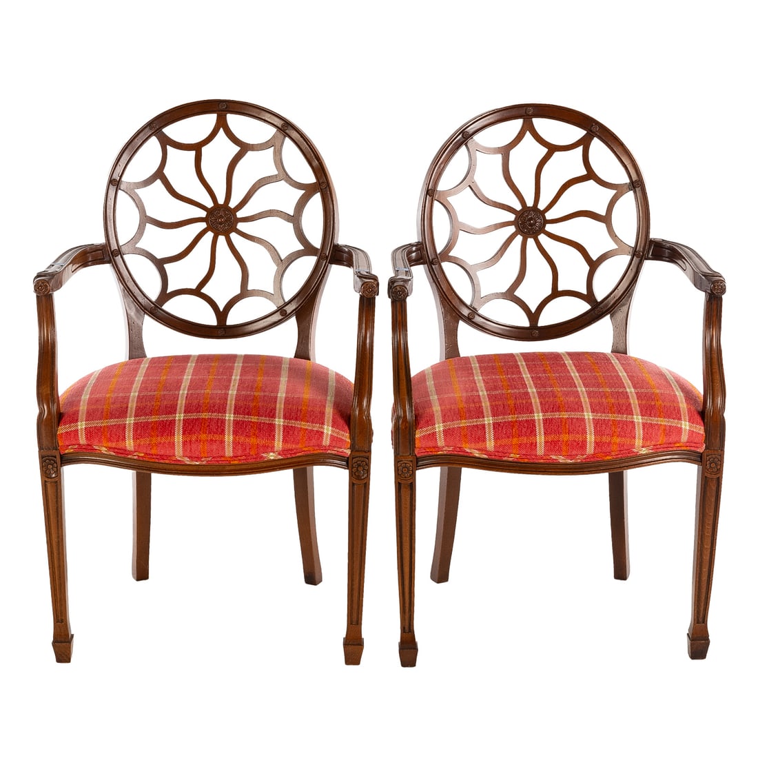 A Pair of George III Style Spider Back Armchairs: Circular mahogany backs with carved center medallions, curvelinear arms with shaped arm supports continuing into matching tapered legs ending in spade feet, 37 1/2 in. H, 24 in. W, 18 in. D