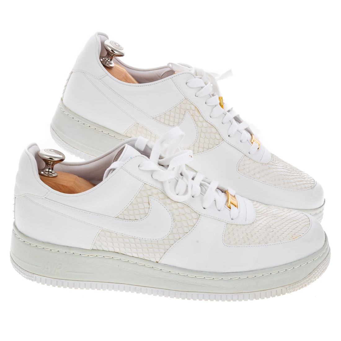A Pair of Nike Air Force 1 Low Lux "Anaconda": A pair of white Nike Air Force 1 Low Lux "Anaconda" 25th anniversary of the first Air Force 1 sneakers, made in Italy with 24K gold plates lace tip aglets and deubre with snake skin accents, #315583-1