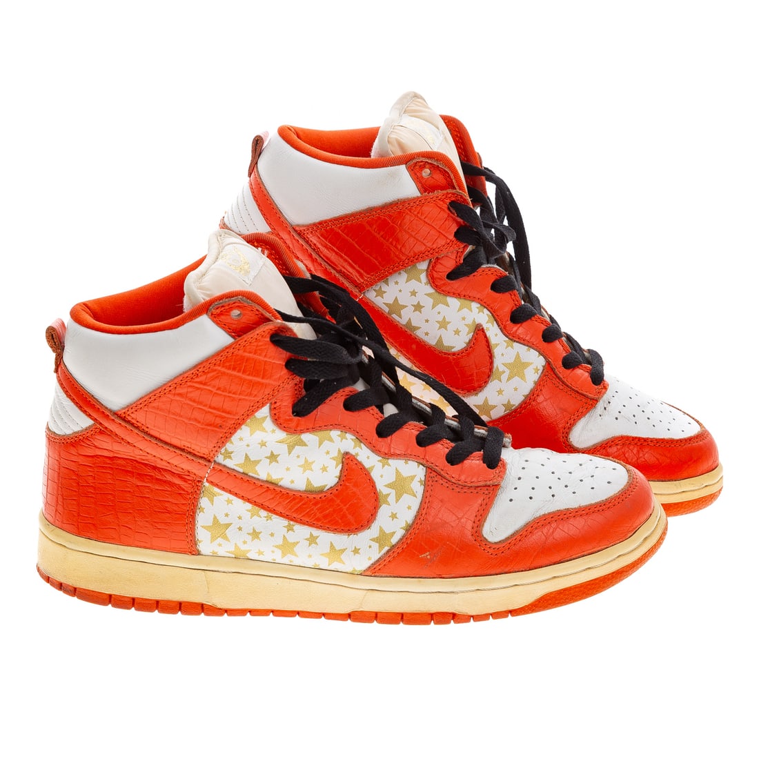 A Pair of Nike Dunk High Pro SB: A pair of "Supreme Orange Stars" Nike Dunk High Pro SB sneakers, #307385, men's size 9, includes original box Provenance: From the Estate of Sean Conway, Annapolis, MD and Los Angeles, CA, an accompli