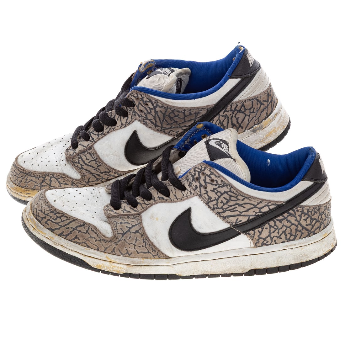 A Pair of Nike SB Dunk Low "Supreme White Cement": A pair of white/grey/black/blue Nike SB Dunk Low "Supreme White Cement" sneakers, 2002, #304292-001, men's size 8.5, includes a box (not original box) Provenance: From the Estate of Sean Conway, Annap