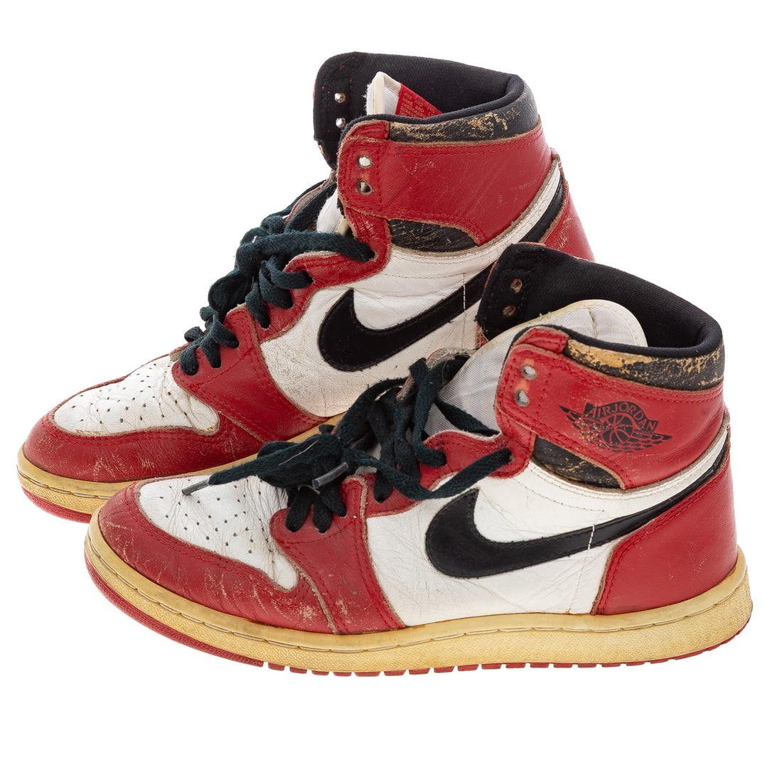 A Pair of Nike Air Jordan 1 Retro High "Chicago": A pair of re/white/black Nike Air Jordan 1 Retro High "Chicago" possibly 1985?, men's unknown size Provenance: From the Estate of Sean Conway, Annapolis, MD and Los Angeles, CA, an accomplished artist