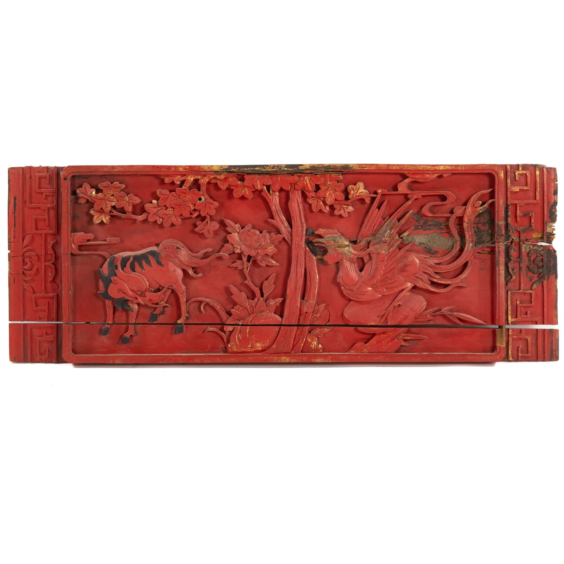 A Chinese Wood & Lacquer Panel: A carved wood and lacquered Chinese panel in high relief depicting a Qilin and rooster/ phoenix, 12 1/2 in. H, 35 in. L, approx. 2 in. D