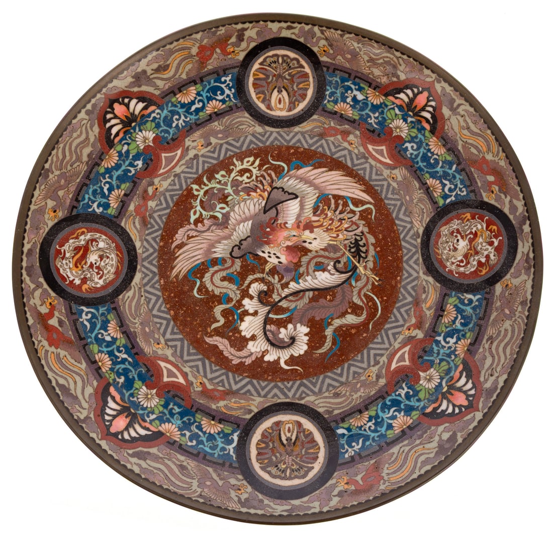 A Japanese Cloisonne Enamel Phoenix Charger: A cloisonne enamel Japanese charger with a central phoenix motif, four medallions surrounding the central image with dragons and butterflies, 1 3/4 in. H, 11 3/4 in. Diam.