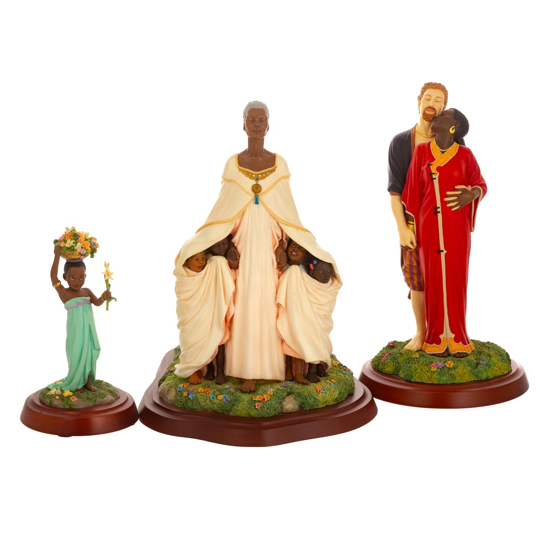Three Thomas Blackshear's Ebony Visions Figures: Including a hand cast resin Thomas Blackshear's "The Flower Girl" depicting a young girl holding a basket of flowers on her head while holding out a flower, limited edition, stamped, marked on bottom,