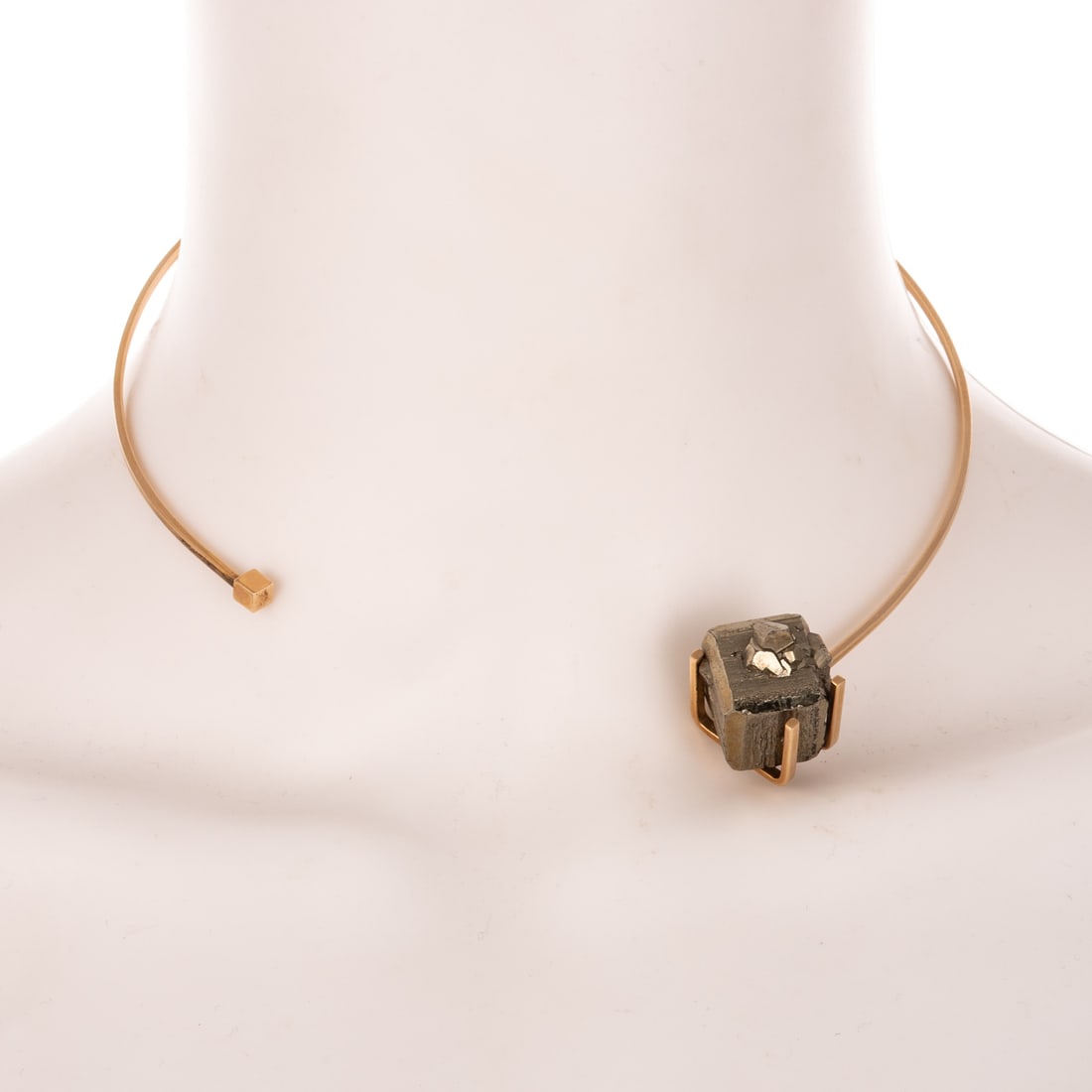 A Betty Cooke Collar with Pyrite Cube in 14K: 14K yellow gold collar necklace by Betty Cooke (1924 - 2024), Baltimore, MD high polish finish collar featuring a natural pyrite cube with matrix in prong setting, signed, approx. interior Diam. 4 3/4