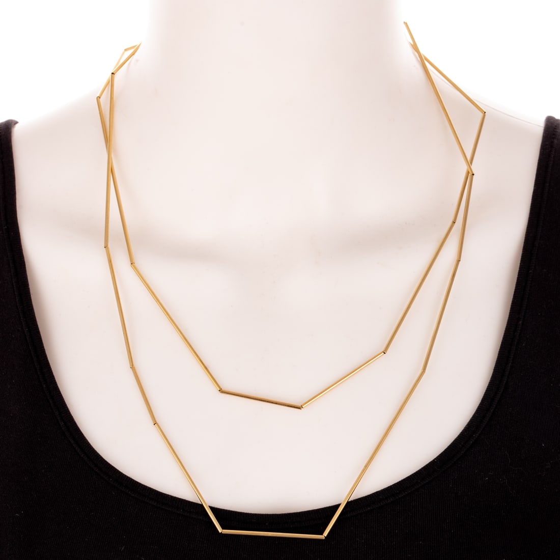 A Betty Cooke Tubular Link Necklace in 14K: 14K yellow gold necklace by Betty Cooke (1924 - 2024), Baltimore, MD with various length high polish tubes, 45 in. L, 15.7 grams Provenance: Property of a private donor with a longstanding affiliation