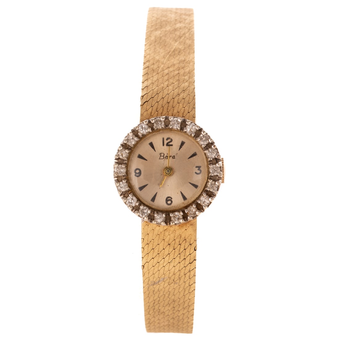 A Diamond & Gold Cocktail Watch in 14K: Vintage 14K yellow gold cocktail wristwatch by Bara, featuring a champagne dial with Arabic numerals and dagger indices, diamond bezel, 20 mm, mechanical movement, integrated tightly woven Florentine