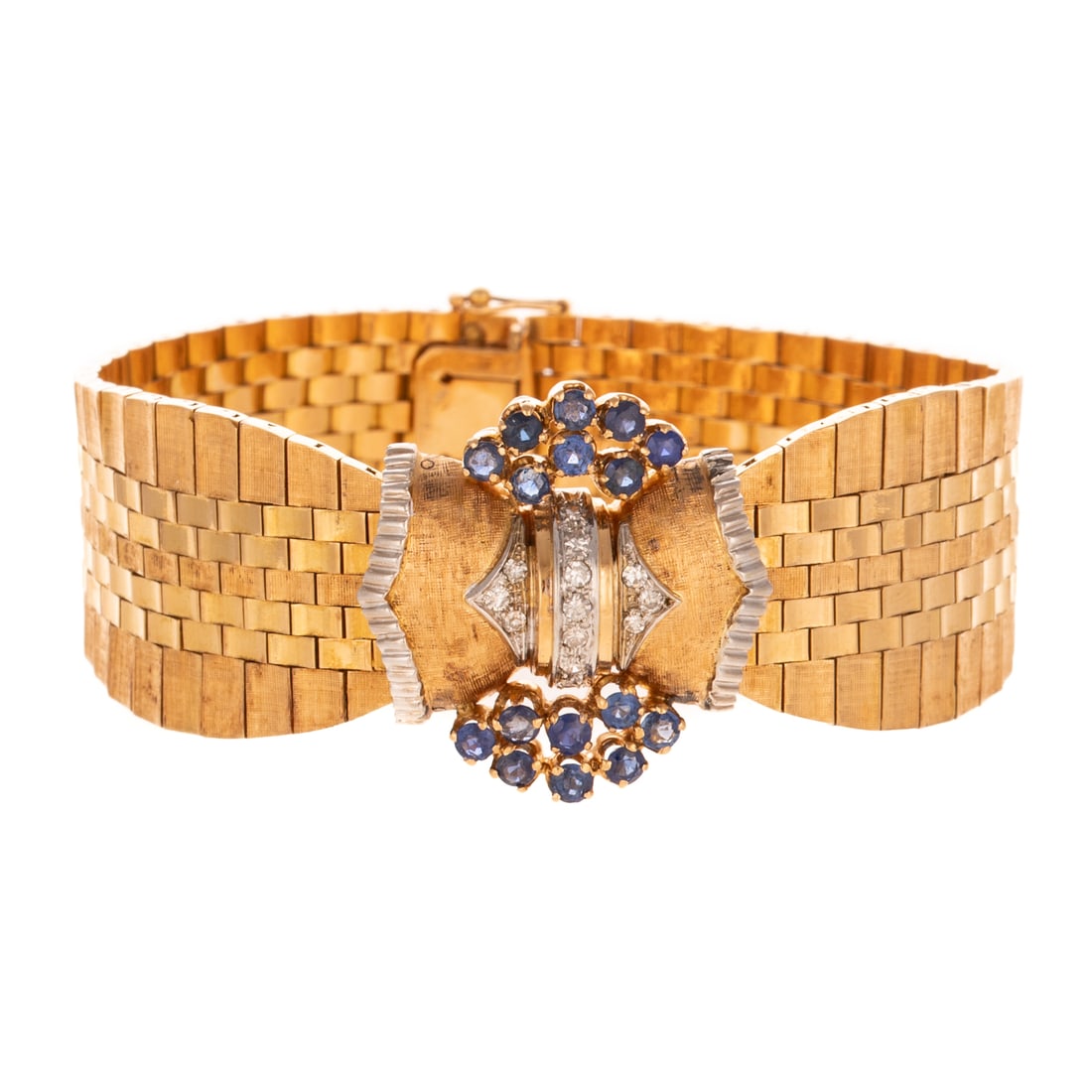 A Vintage Sapphire & Diamond Bow Bracelet in 18K: Vintage 18K yellow gold bracelet with a central stylized bow featuring round diamond accents weighing approx. 0.16 ctw bead set with clusters of round sapphires weighing approx. 1.60 ctw prong set,