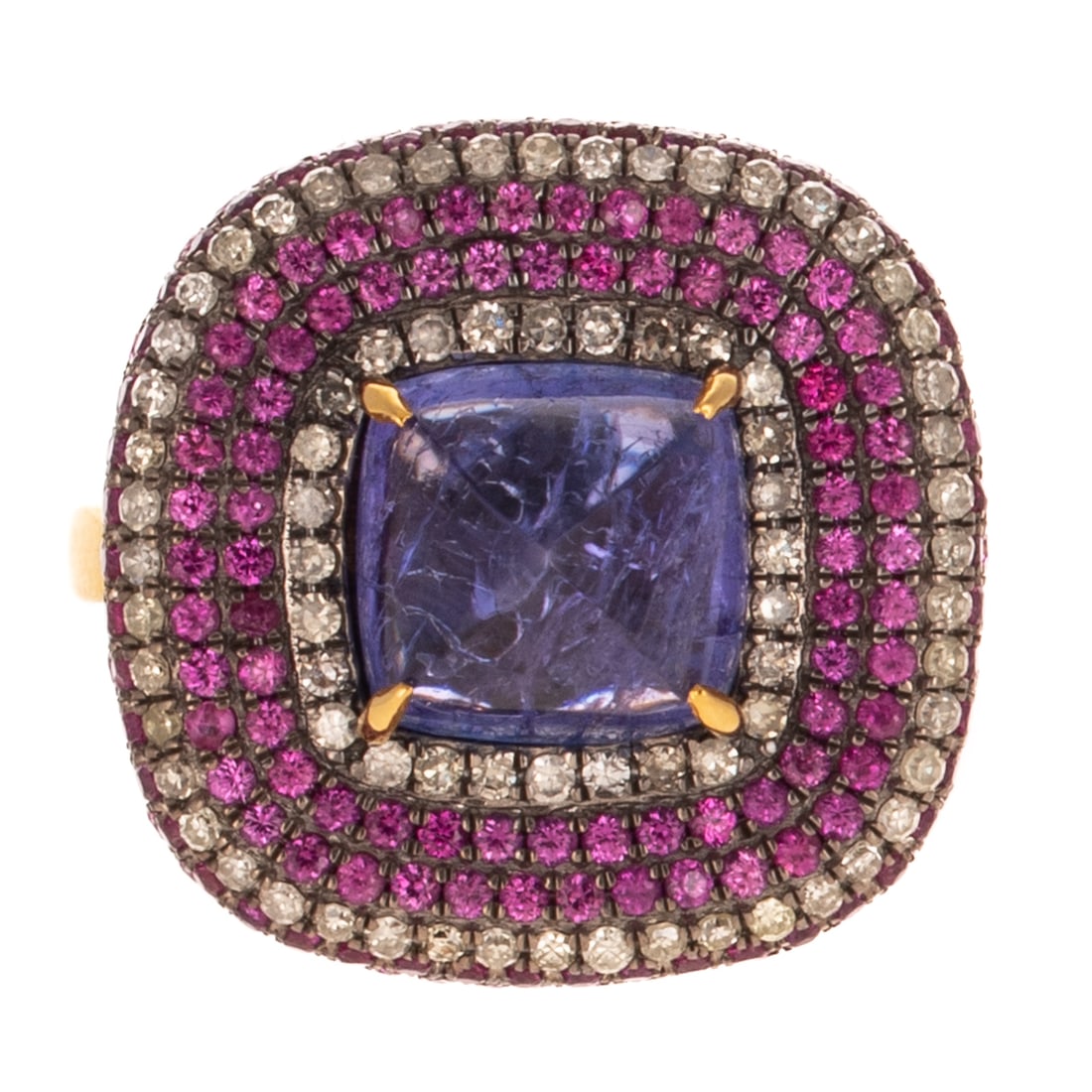 A Tanzanite & Pink Sapphire Ring in Sterling Silver: Sterling silver ring featuring a square sugarloaf tanzanite cabochon measuring 7.6 x 7.9 mm prong set in the center of alternating round diamond and pink sapphire bead set halos, 14K yellow gold high 