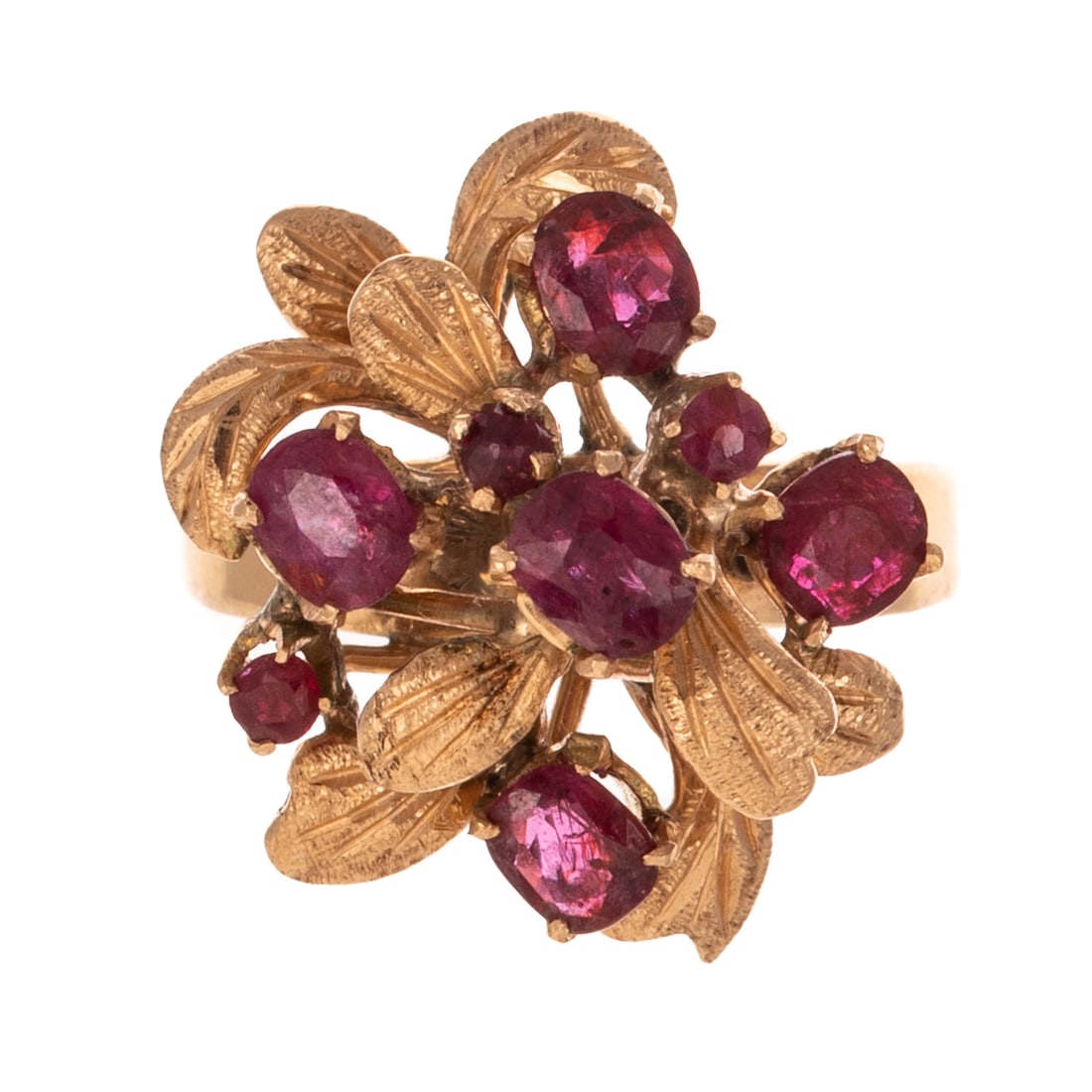 A Foliate 1.00 ctw Ruby Ring in 14K: 14K yellow gold ring featuring a cluster of mixed cut rubies weighing approx. 1.00 ctw prong set among a cluster of textured leaves, signed, sz 5.75, 5.7 grams
