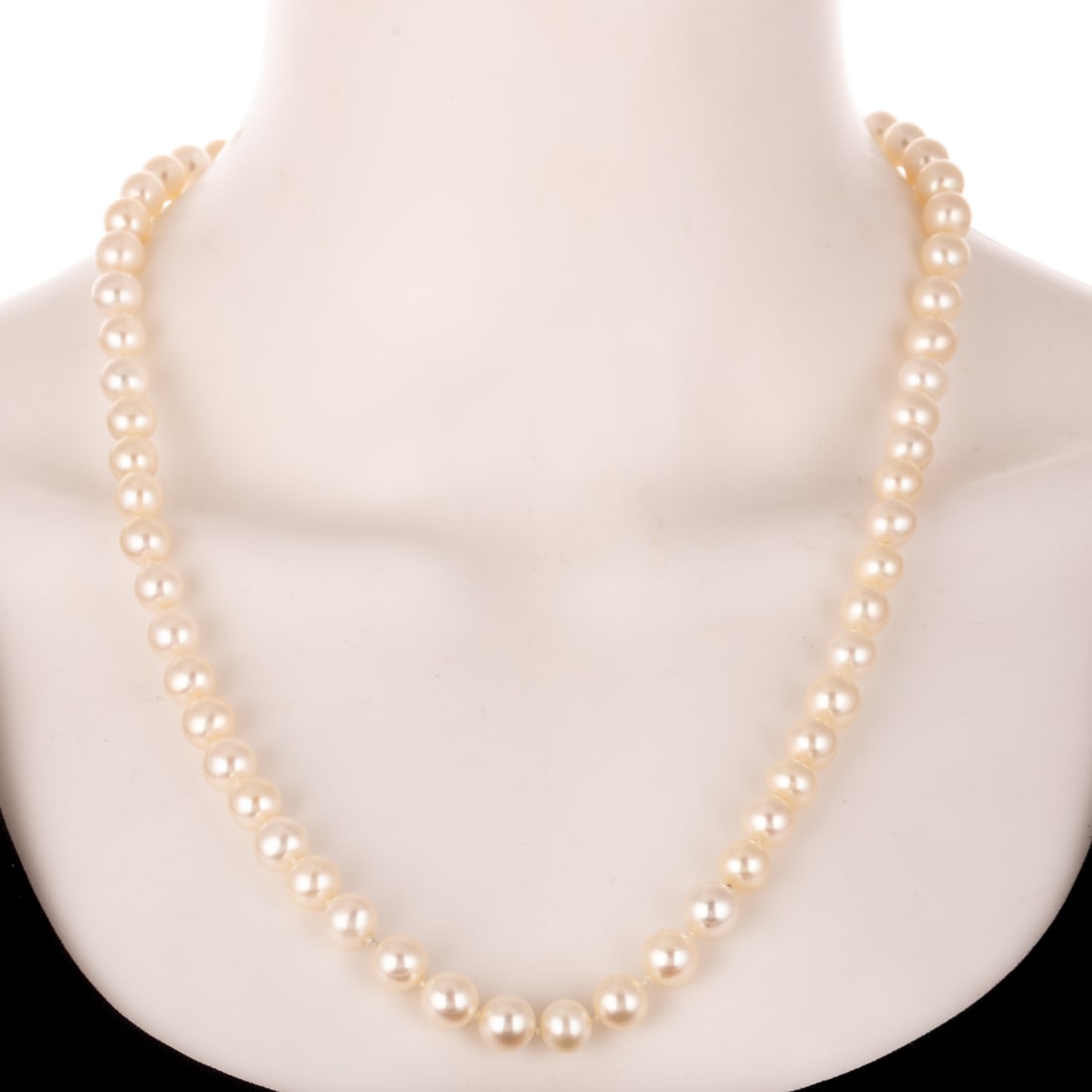 A Pearl Necklace with Diamond Clasp in 14K: 14K yellow gold matinee length cultured pearl necklace, 8.5 - 9.5 mm, good lustre, with a ribbed gold screw clasp with a band of round diamond accents, bead set, 24 in. L, and 2) Wire lingerie pin wit