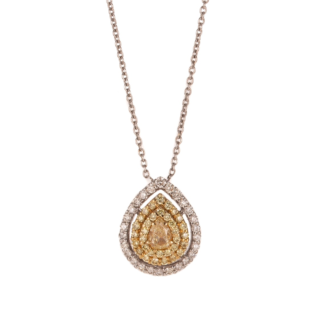 A Yellow Diamond Pear Halo Necklace in 18K: 18K white gold necklace with a pear pendant featuring a pear shaped yellow diamond prong set in the center of a double round yellow diamond halo with an outter halo of round white diamonds, all