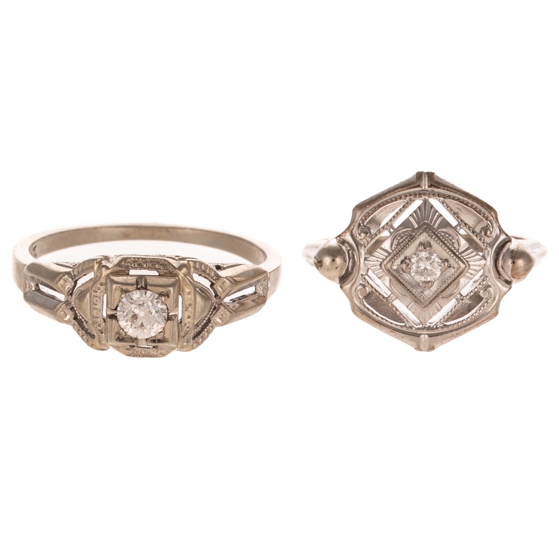 Two Art Deco Diamond Rings in 18K & 14K: 1) 18K white gold Art Deco ring featuring an Old European cut diamond weighing approx. 0.15 ct bead set in a square with milgrain and filigree details, sz 7, and 2) 14K white gold Art Deco style ring 