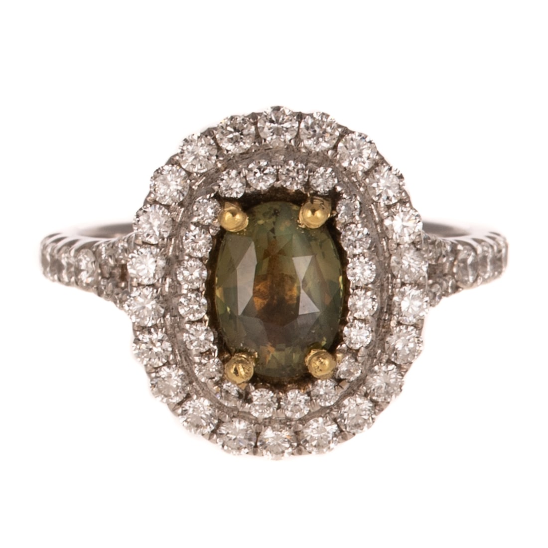A GIA 1.48 ct Alexandrite Ring in 18K: 18K white gold ring featuring an oval shaped alexandrite weighing 1.48 cts with yellowish green to brownish yellow color change, accompanied by GIA Gemological Report #5231895649, prong set in yellow 