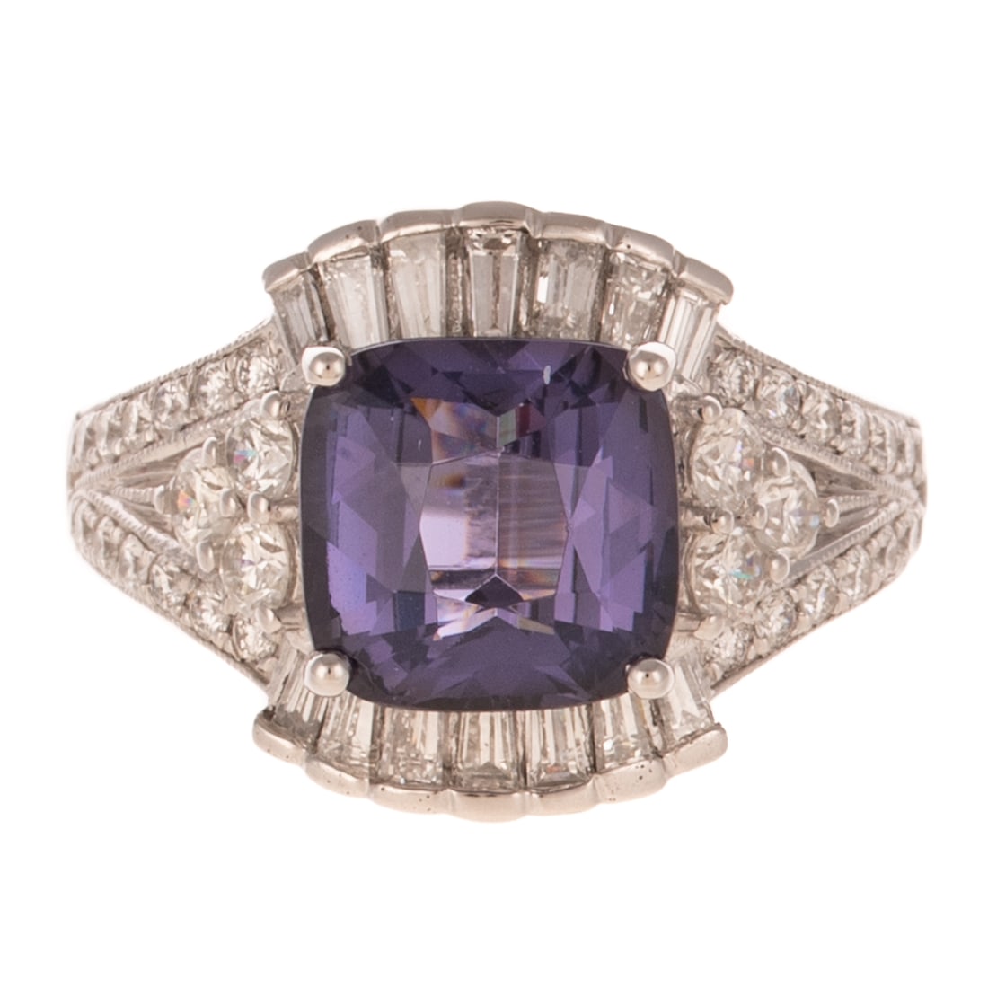 An Unheated 3.70 ct Purple Spinel Ring in Platinum: Platinum ring by Offo Goffieb featuring a cushion cut unheated purple spinel weighing 3.70 carats, accompanied by GIA Gemological Report #2235762666, prong set with a frame of baguette and round diamo
