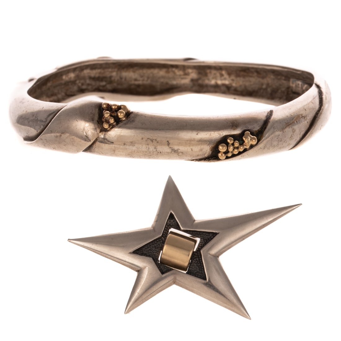A Georg Jensen Bangle & P. Boregaard Star Pin in Sterling Silver & 18K: 1) Sterling silver and 18K yellow gold Georg Jensen bangle designed by Ole Kortzau, model #332B, hallmarked and signed, 2 1/2 in. Diam., and 2) 1989, Sterling silver and 18K yellow gold large star