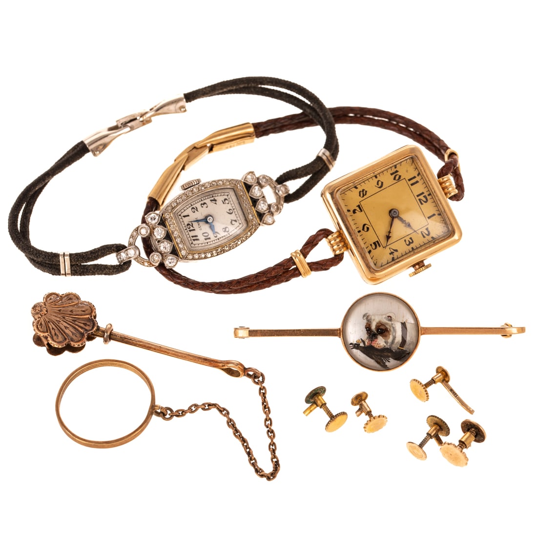 An Essex Crystal Pin, Two Vintage Watches & More: 1) Antique 15K yellow gold Essex crystal pin featuring a bulldog with a crowned bird, personalization on verso, 2 1/4 in. L, 2) Platinum and diamond cocktail watch by Geneve, white dial with Arabic