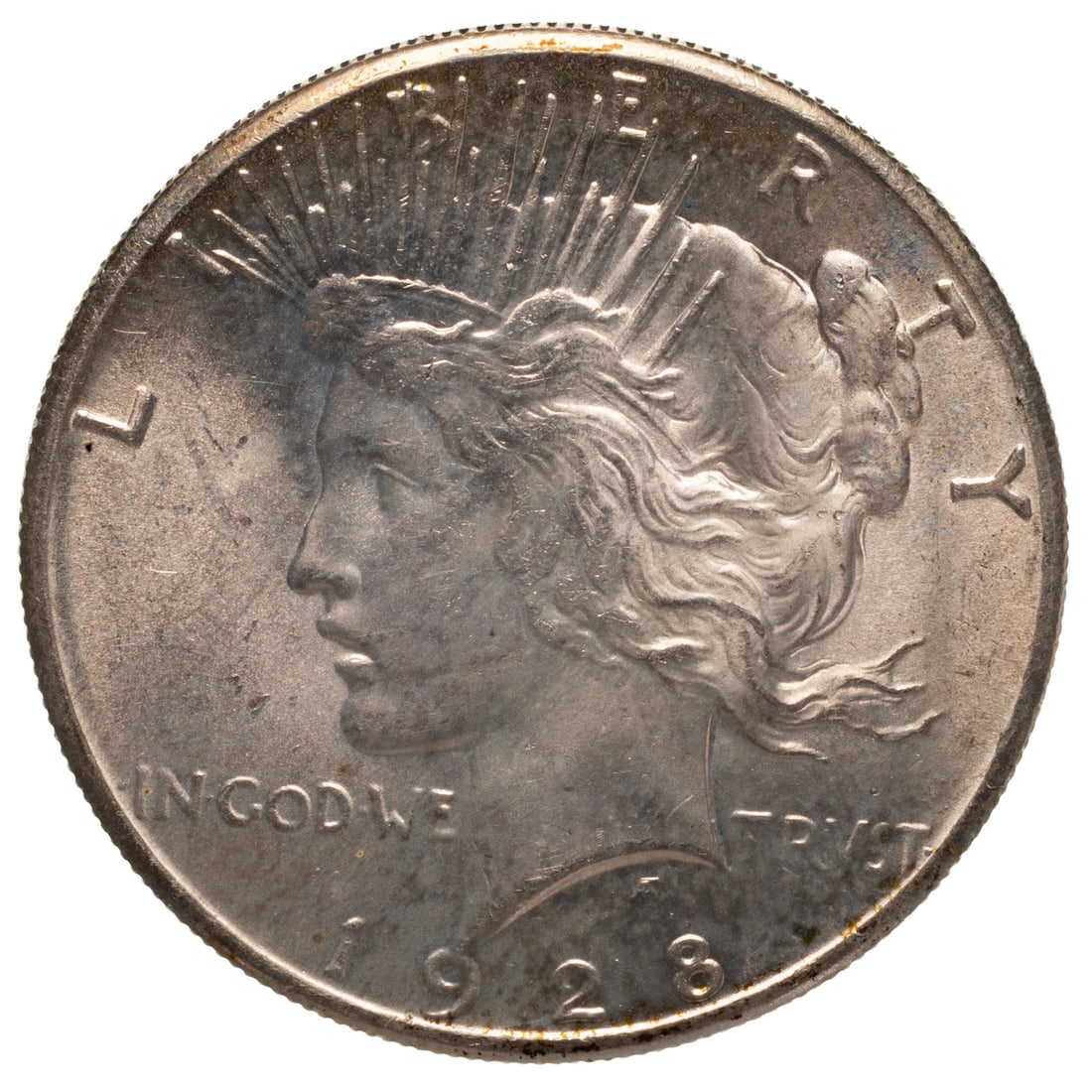 1928 Peace Dollar - MS63 - Key Date: Key Date - with white fields and superb luster. Original color and surfaces with no problems Provenance: Lifetime numismatic property of a long time Baltimore collector