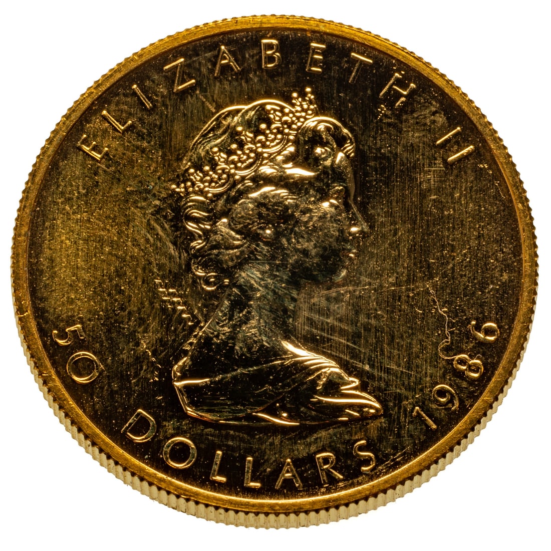 1986 1 oz Gold Maple Leaf: .9999 product of the Royal Canadian Mint. Passed Sigma testing