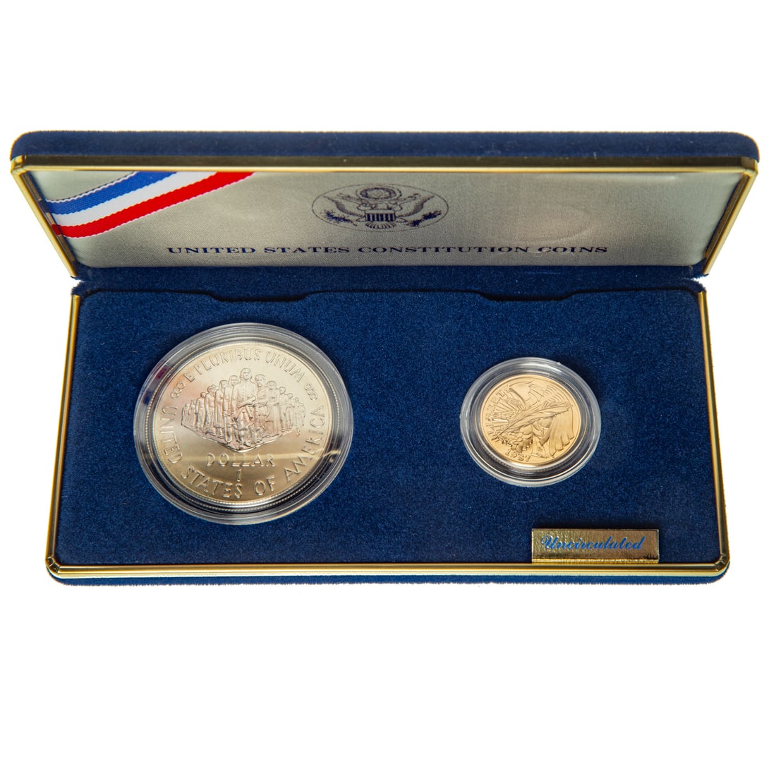 1987 U.S. Constitution Two-Coin Commemorative: Silver Dollar and $5 Gold (.2419 toz) in mint purple/blue case but no COA or box Provenance: Lifetime numismatic property of a long time Baltimore collector