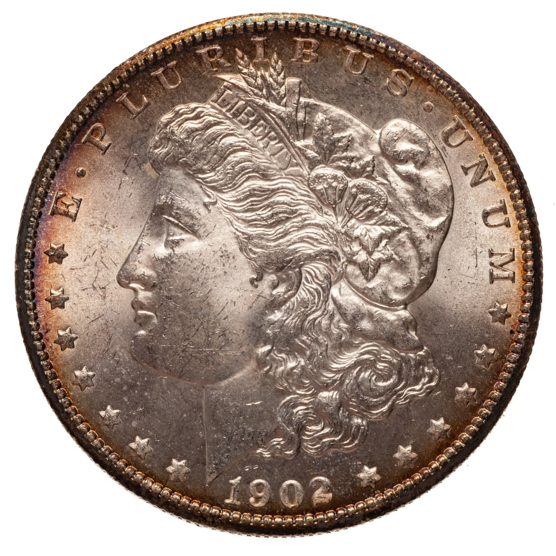 1902-S Morgan MS61 Or Better: Darker Raymond album toning moves inward to lighter fields to produce a PQ eye appeal coin and the 61 could be conservative. Much better date in higher grades Provenance: Lifetime numismatic property