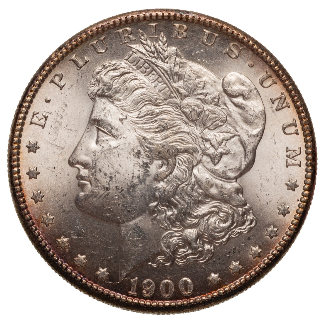 1900-S Morgan Dollar MS61: Complete luster on both side with just the lightest touch of toning along the edges. Facial bag marks hold back a higher grade Provenance: Lifetime numismatic property of a long time Baltimore