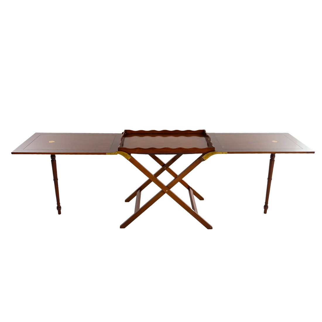 Baker "The Party Butler" Folding Butler's Table: Mahogany and brass folding extension table with removable butler's tray top with screw in legs on an x-shaped stretcher, fully extended size: 28 in. H, 89 in. W, 21 1/4 in. D Provenance: From a