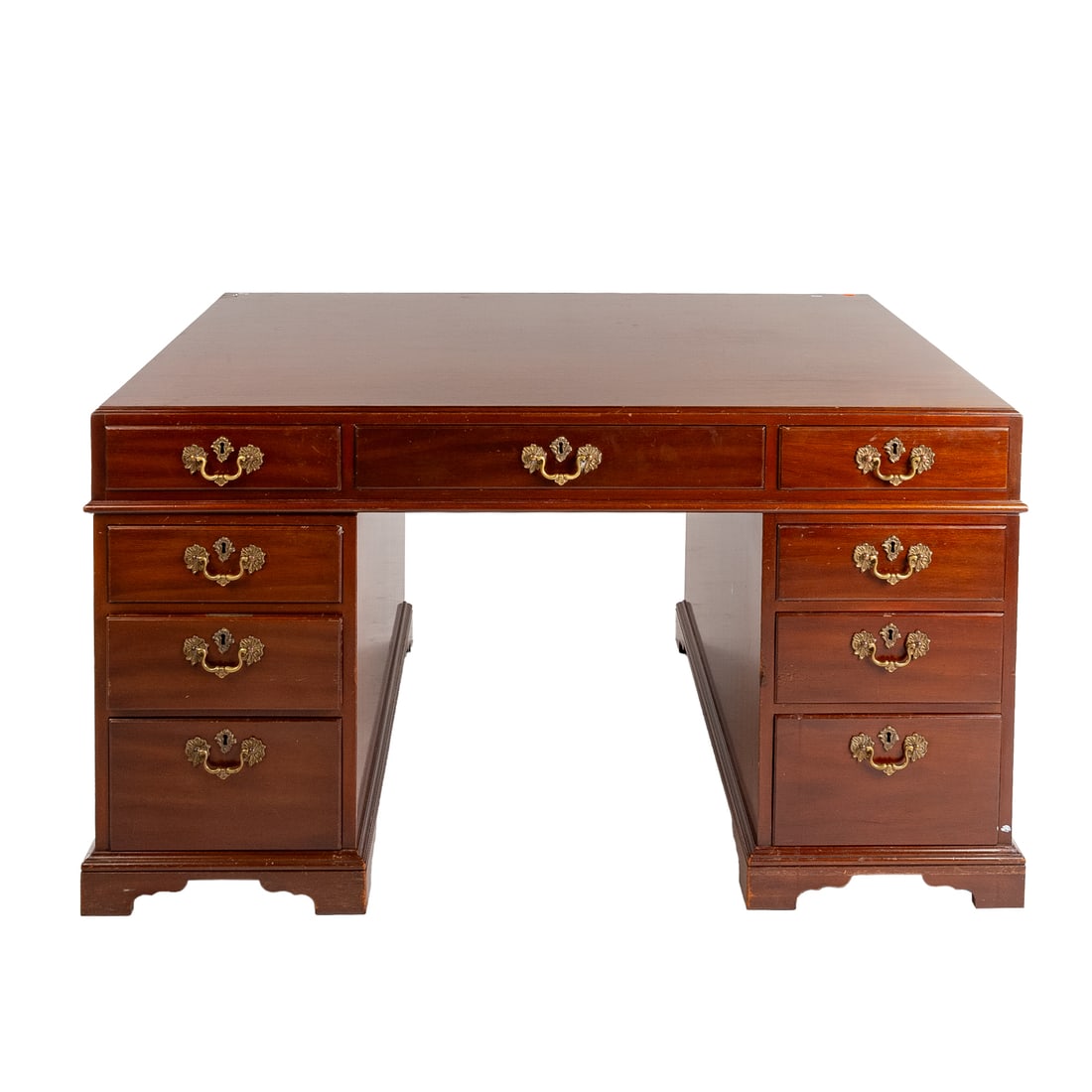 Kittinger Mahogany Partners Desk: Colonial Williamsburg reproduction, three part partners desk with molded top over six drawer apron resting on two six-drawer cases with heavy bail pull handles, resting on bracket feet, 32 1/4 in. H, 
