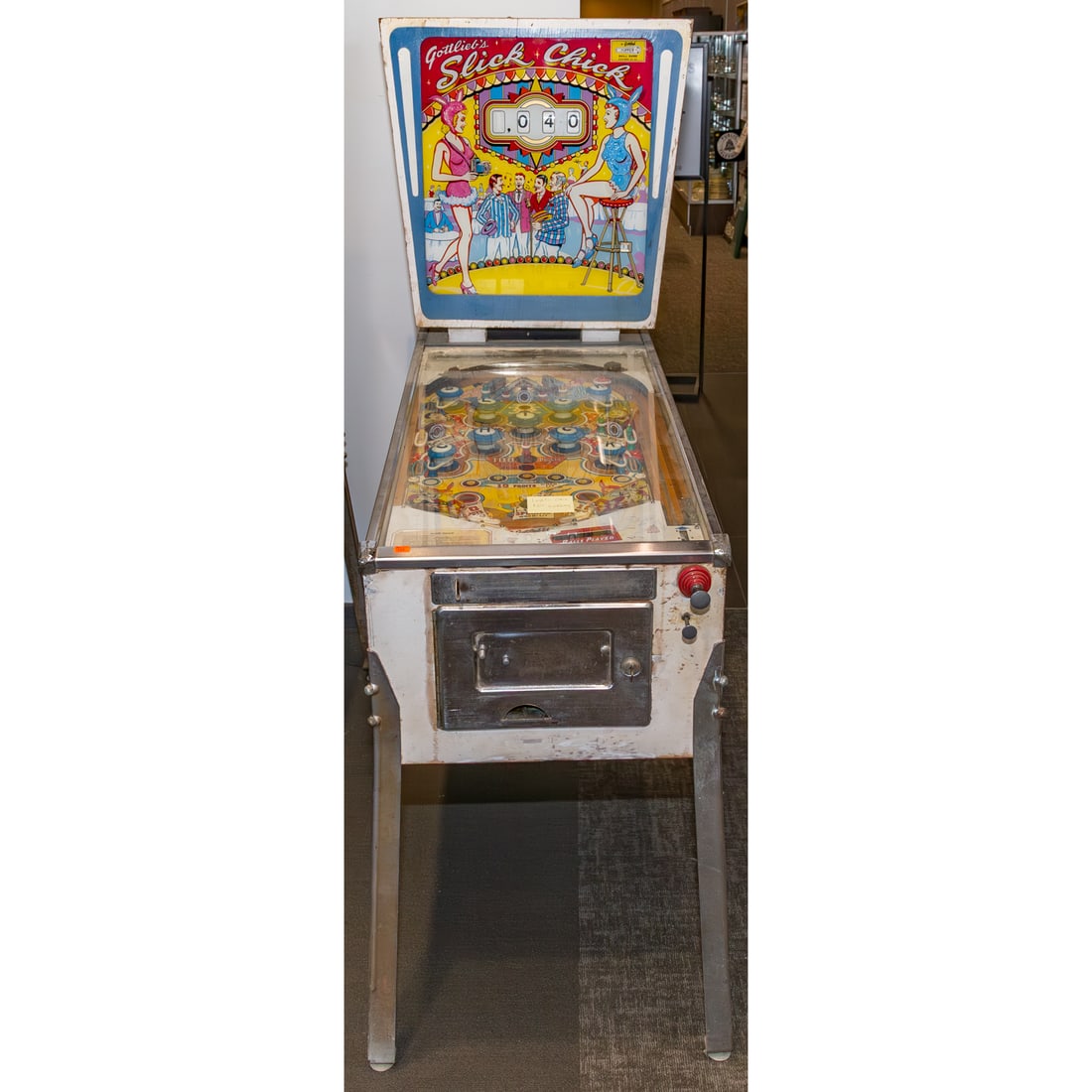 Gottlieb Vintage 1963 Slick Chick Pinball Machine: 69 in. H, 26 in. W, 54 in. D Provenance: From a Baltimore Collector, Known Locally as the "Pinball Wizard"