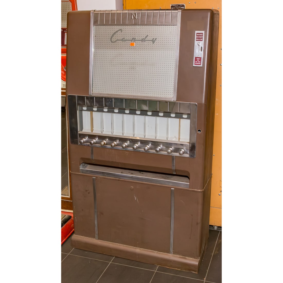 National Vendors Vintage Candy Machine: 60 in. H, 34 in. W, 12 in. D Provenance: From a Baltimore Collector, Known Locally as the "Pinball Wizard"