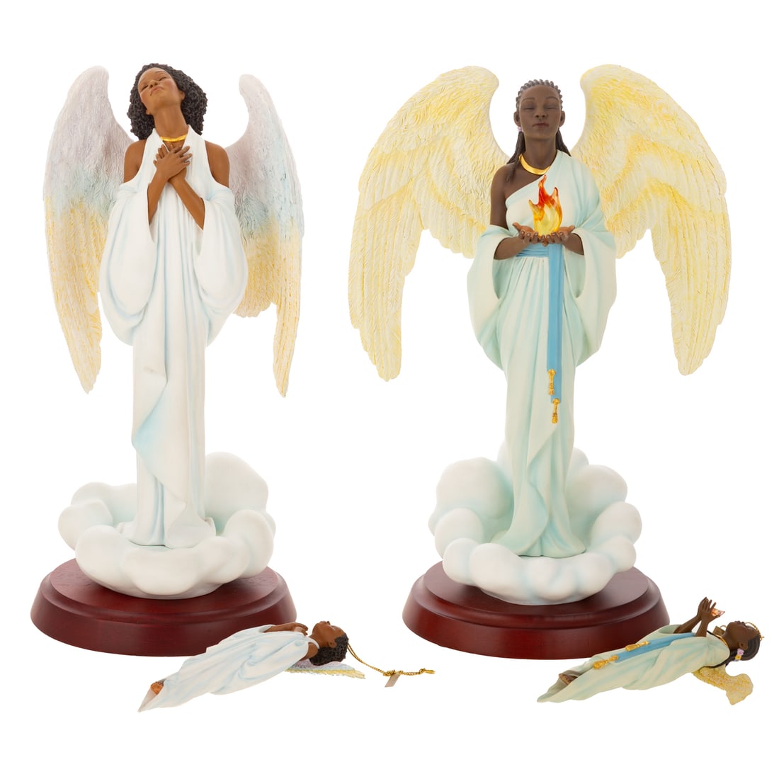 Two Thomas Blackshear's Ebony Visions Figures with Ornament: Including a hand cast resin Thomas Blackshear's "Faith" depicting an angel standing on clouds with her hands at her chest, collector club series, stamped, 2004, includes COA, original box, and small