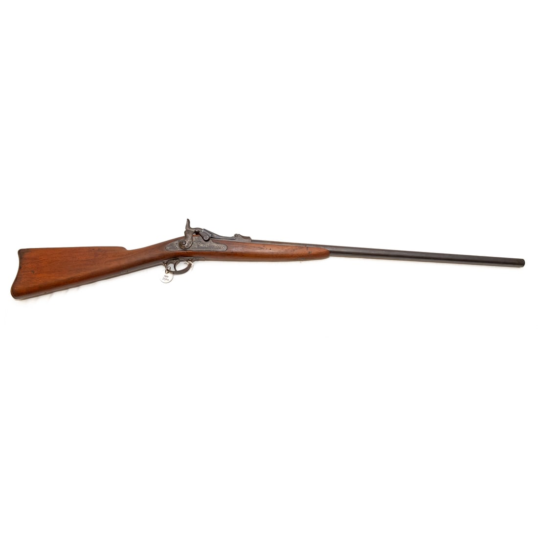 A Springfield Model 1881 Forager Shotgun: Probably a percussion conversion to a modified trapdoor breechloader; serial number "220," marked on back of breach (reportedly, only 1376 were produced); 20 gauge; the barrel, 26 in. L; the lockplate