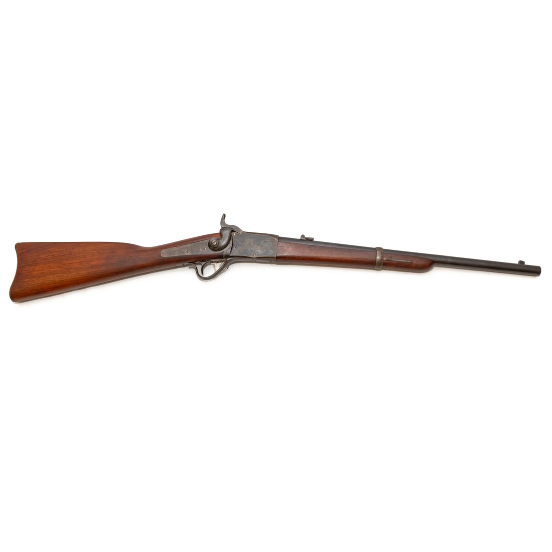 A Peabody Model 1865 Carbine Rifle: Providence Tool Co., made without serial numbers; lever action falling block receiver, .50/70 caliber rimfire round; the barrel, 20 in. L.; saddle ring; tilt-up peep-hole rear sight and bladed lug at 