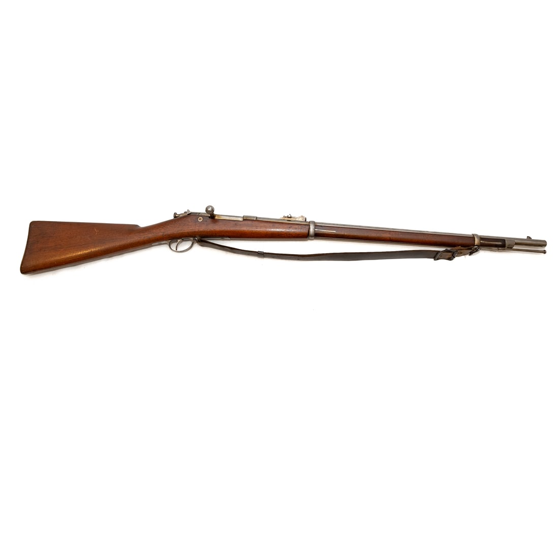 A Winchester Hotchkiss Model 1878 Navy Rifle: Serial number 5318, marked on the left edge of receiver; the barrel, 29 in. L; bolt action repeater (with internal magazine in the stock holding 5 rounds), 45-70 caliber centerfire; graduated ladder