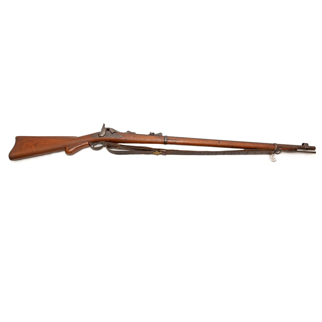 A Springfield Model 1881 Long Range Trapdoor Rifle: Serial number 256653, marked on top of receiver; one from a production run of about 200, modified from the Model 1878 with a chamber 2.4 in. L, to hold a larger shell (.45/80X500), and with a barrel