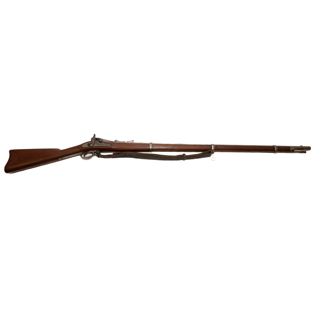 A Springfield Model 1866 Allin Trapdoor Rifle: Converted from a Model 1864 musket, the 2nd Allin conversion; .50 caliber; the barrel, 36 in. L; notch rear sight (possibly incomplete), bead front sight; leather shoulder strap of the period; the loc